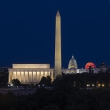 Blue Supermooon Rising over the U.S. Capitol and Smithsonian Institute.
