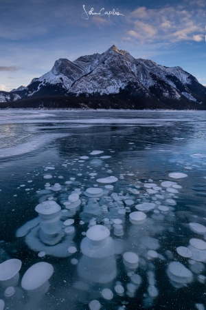 Stacked frozen bubbles in front of Mount Michener