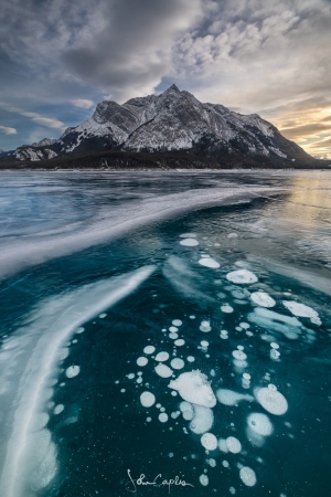 Ice cracks pointing to Mount Michener before sunset