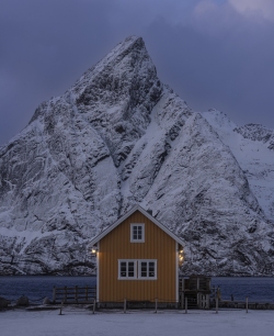 Iconic yellow rorbu in Sakrisoy at Twilight